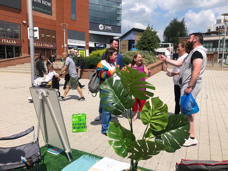 A crowd gathers for the parklet by Grapevine in Coventry city centre